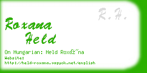 roxana held business card